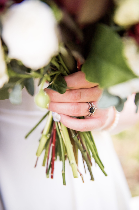 Wedding ring & brdal bouquet.  Eugene & Sunriver's best wedding and elopement photography is Photography by Lynn Marie.