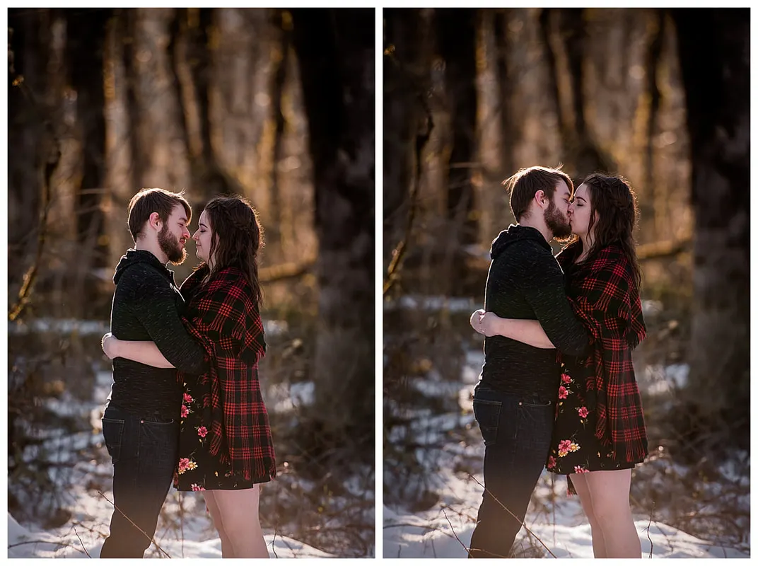 Engagment photo session of a couple taken in trees and snow at Dorris Ranch in Oregon